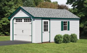 a-frame garage with white siding and green trim
