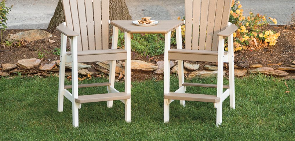 Tan and white balcony chair settee with attached table.