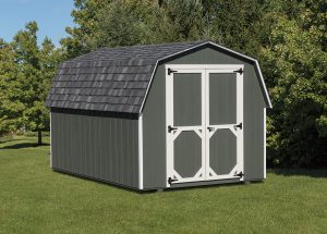 Mini Barn Shed with green wood siding, white trim, gray asphalt roofing, and green double doors with white trim.