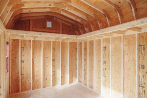 inside of a shed with a loft