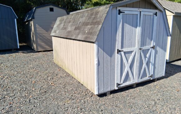 Used 8x12 wood mini barn $1400.00